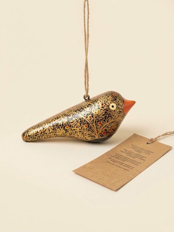 black and gold leaf hanging bird