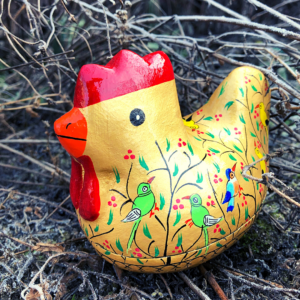 Gold birds opening hen